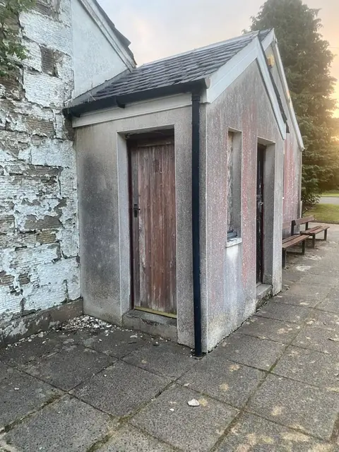 Clubhouse side porch before cleaning